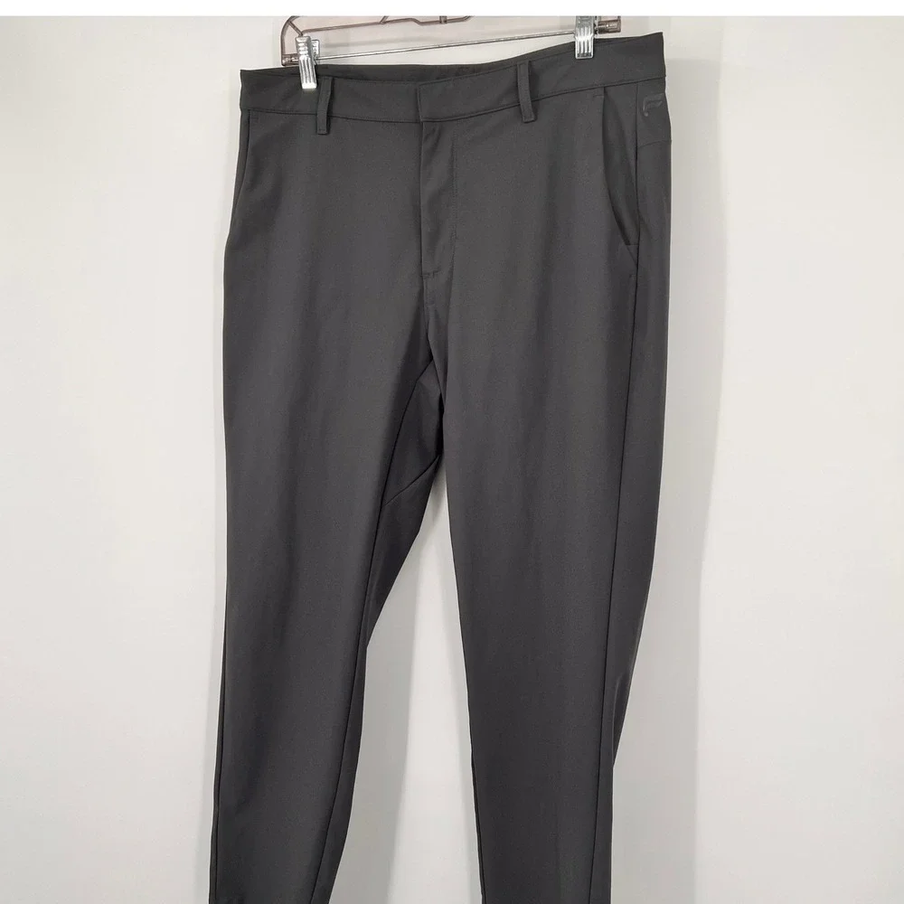 Fabletics Mens The Only Pant Onyx Gray Tapered Performance Trousers 35x28.5